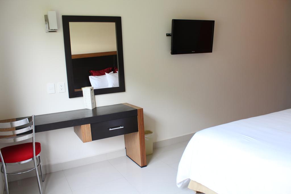 Hotel El Palmar Inn Эль-Морро Номер фото